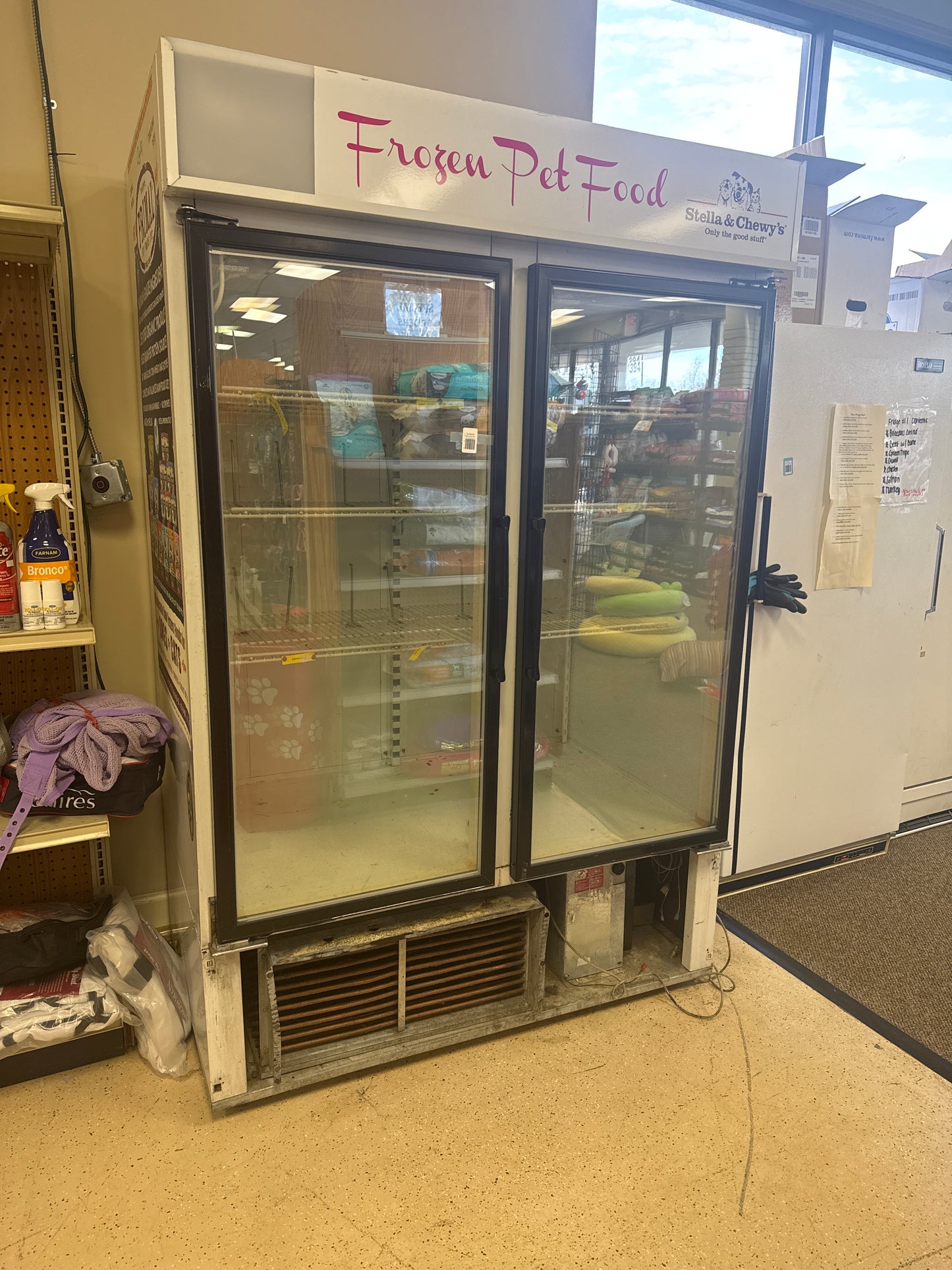 Glass double door pet food freezer-will need repairs