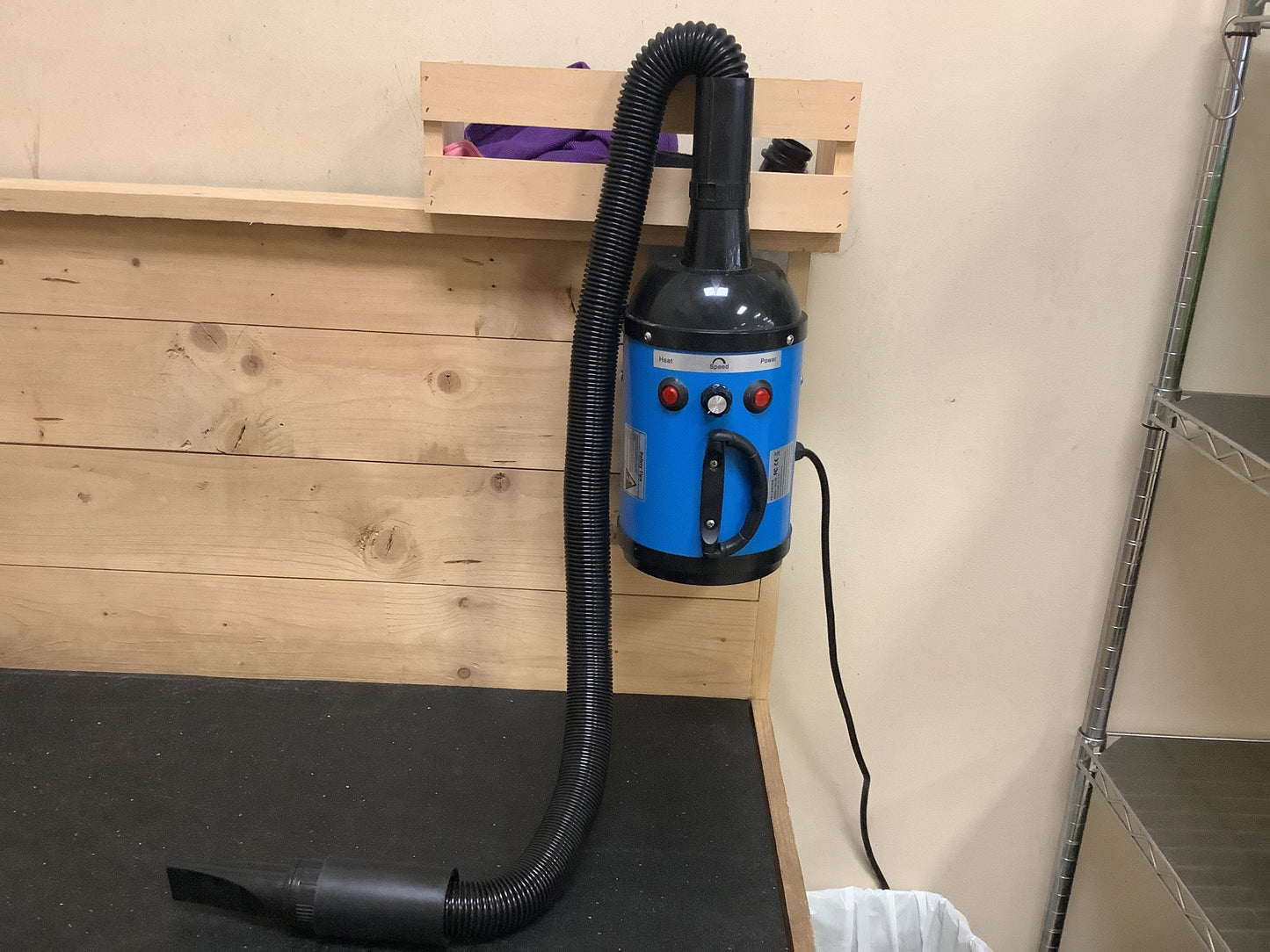 Raised dog grooming table, and dryer