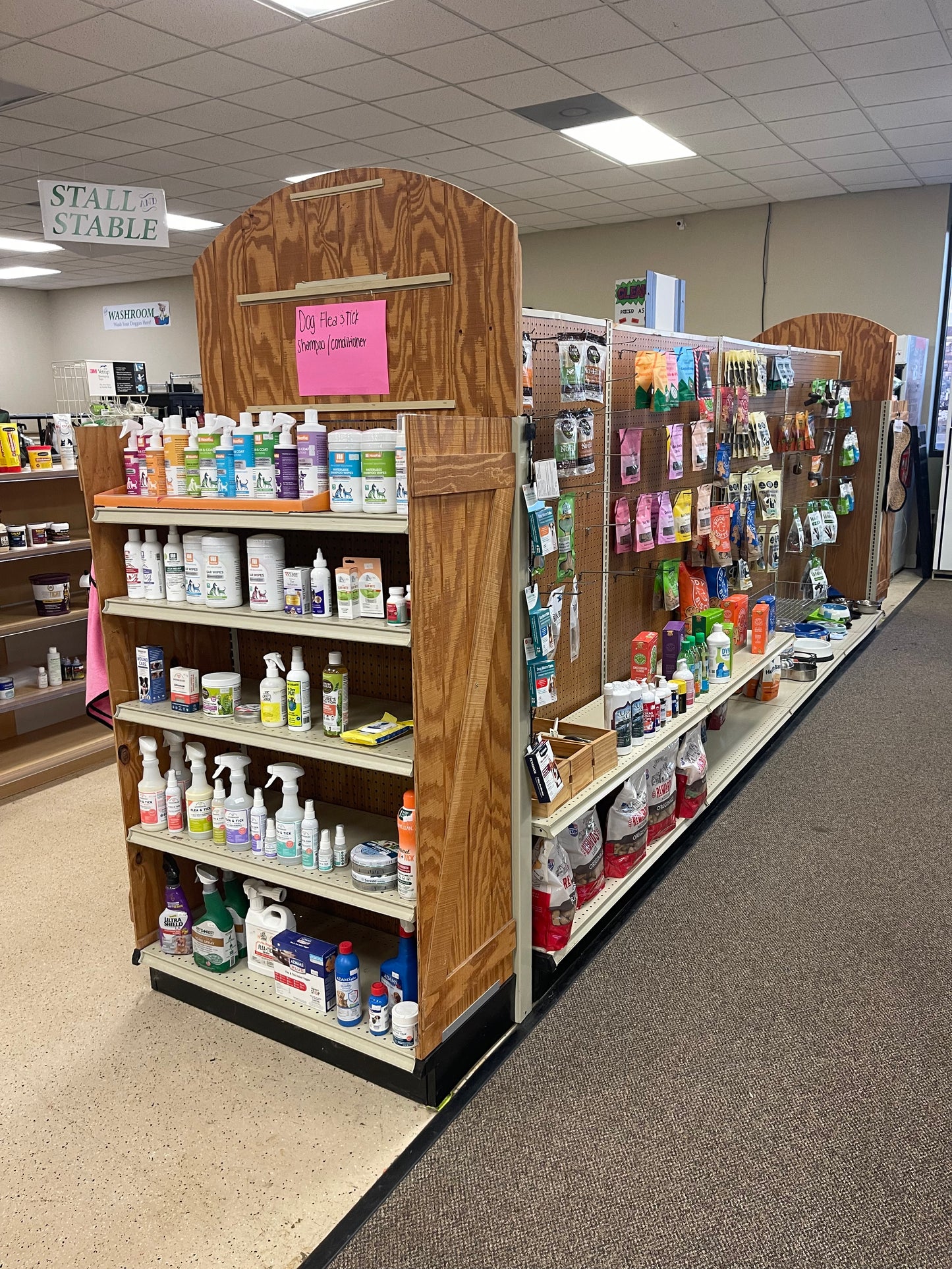 Double sided gondola with four 4' pegboard sections, 2 end caps