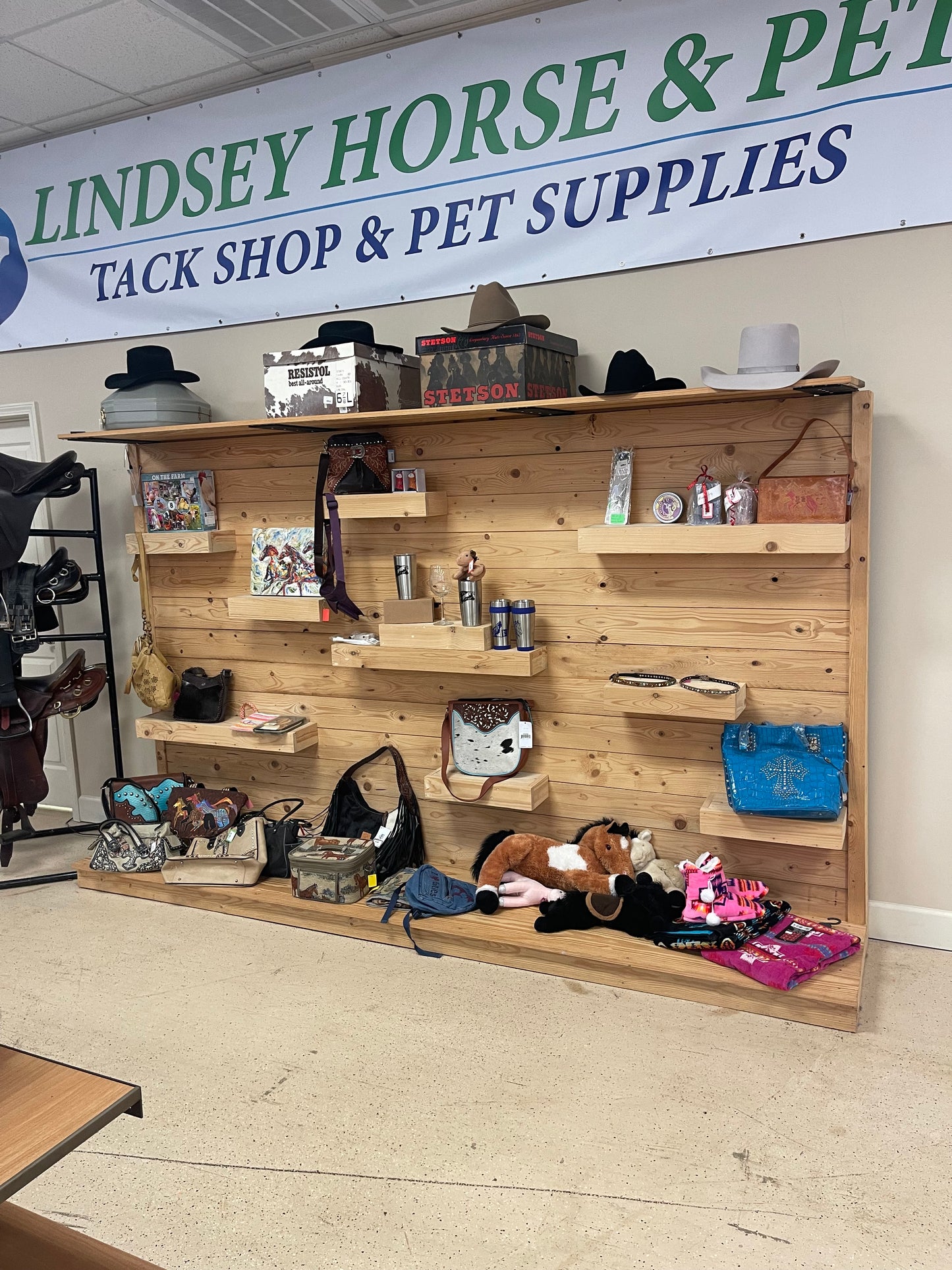 10' wooden custom built display shelving with under-lights