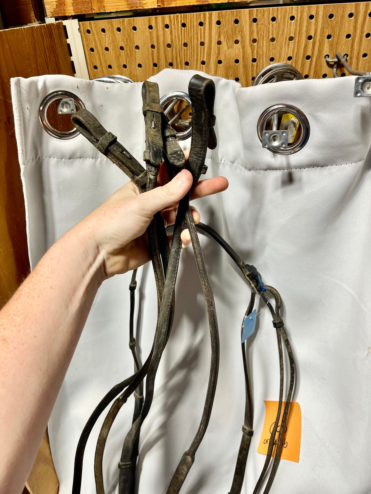 58" Set of 2 matching black double bridle reins, #1 leather 5/8" w/stoppers, #2 leather 5/8" smooth curb rein, rolled ends on both. Heavily used