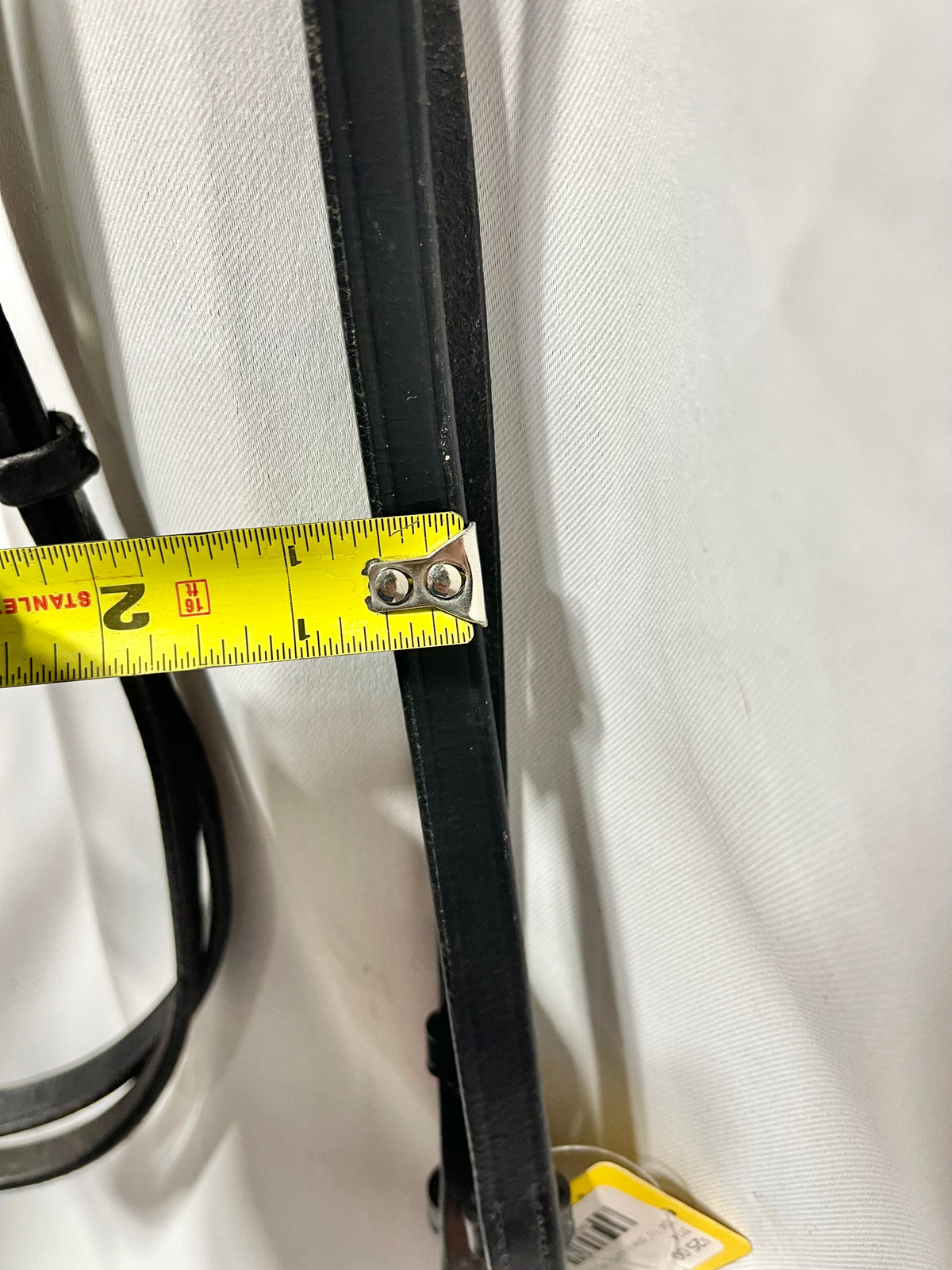 58" thin ½” black English curb rein with leather keeper at top, lightly used