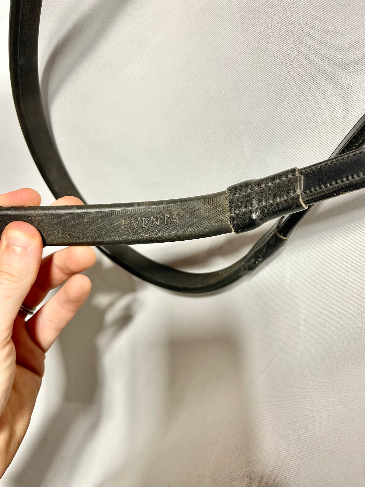 55" Equus Rubber Eventa black rubber grip reins, with bridle fastener ends. Well used
