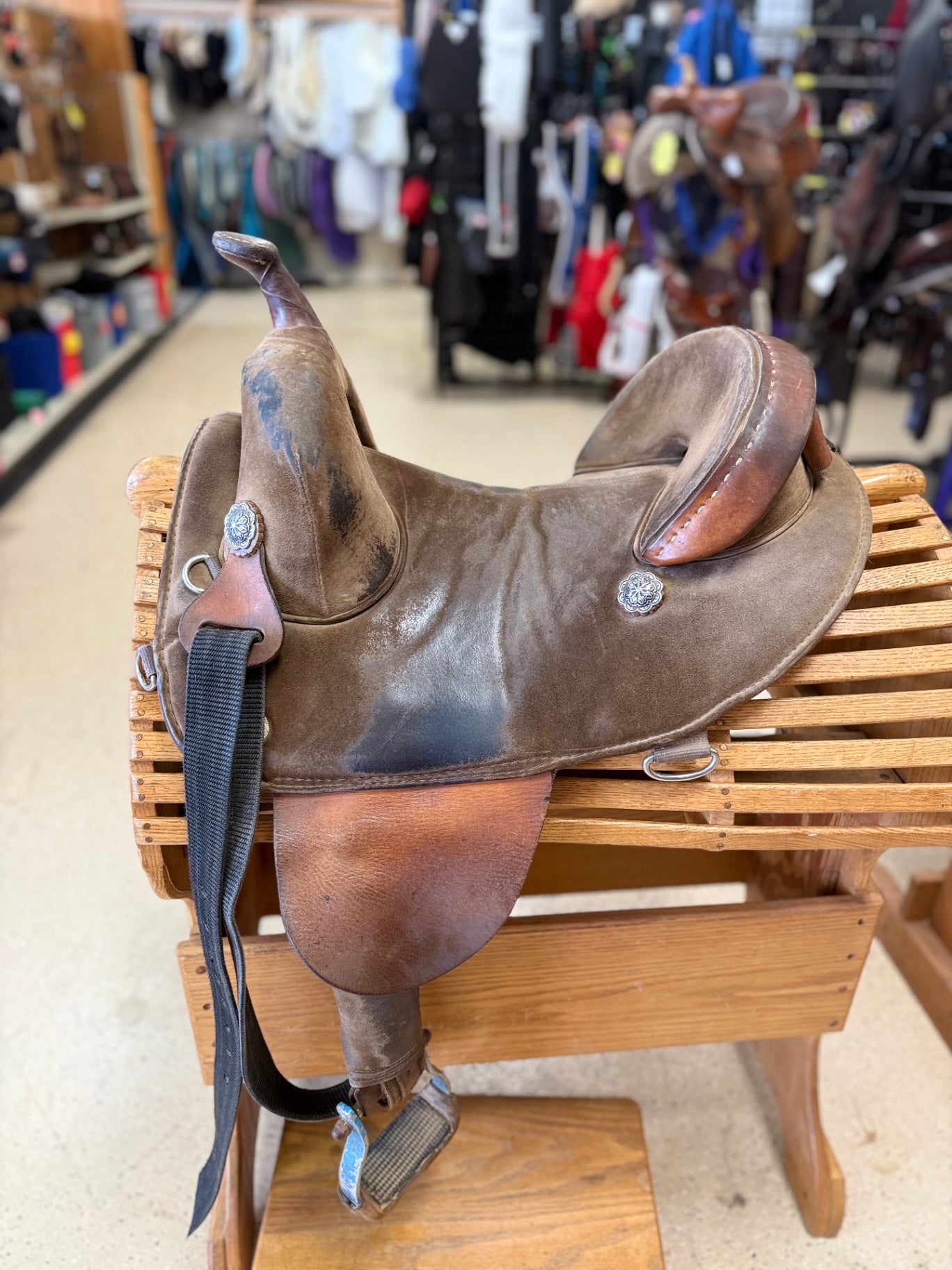 1.  14” Brown Bob Marshall treeless barrel sports saddle, 8" leg opening from seam of pommel to seam of cantle