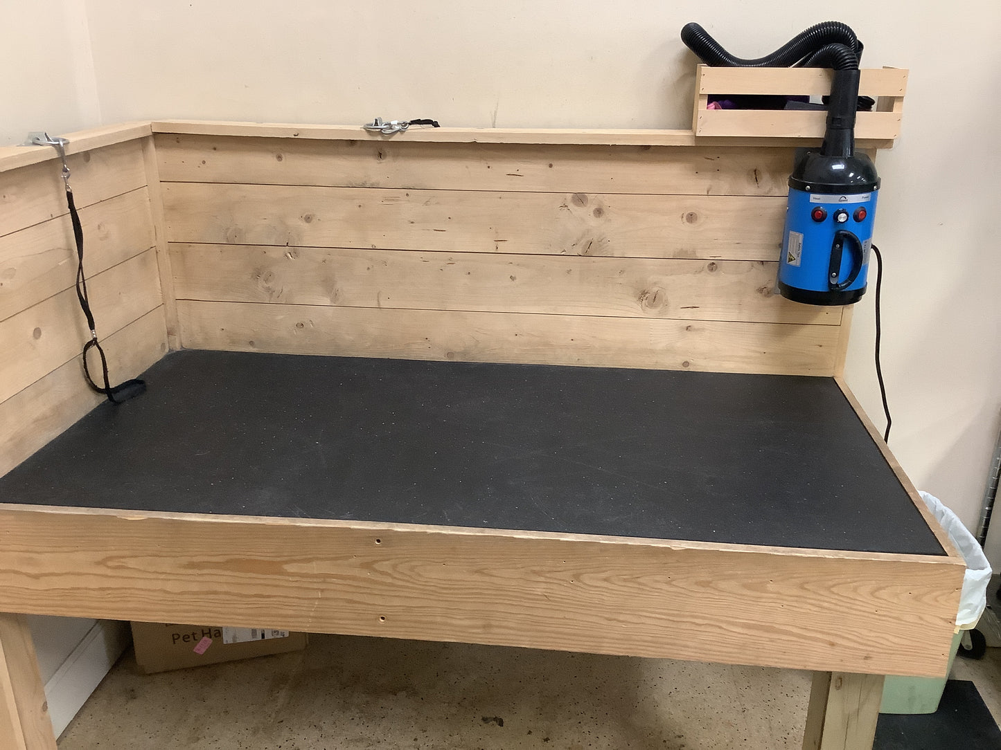 Raised dog grooming table, and dryer