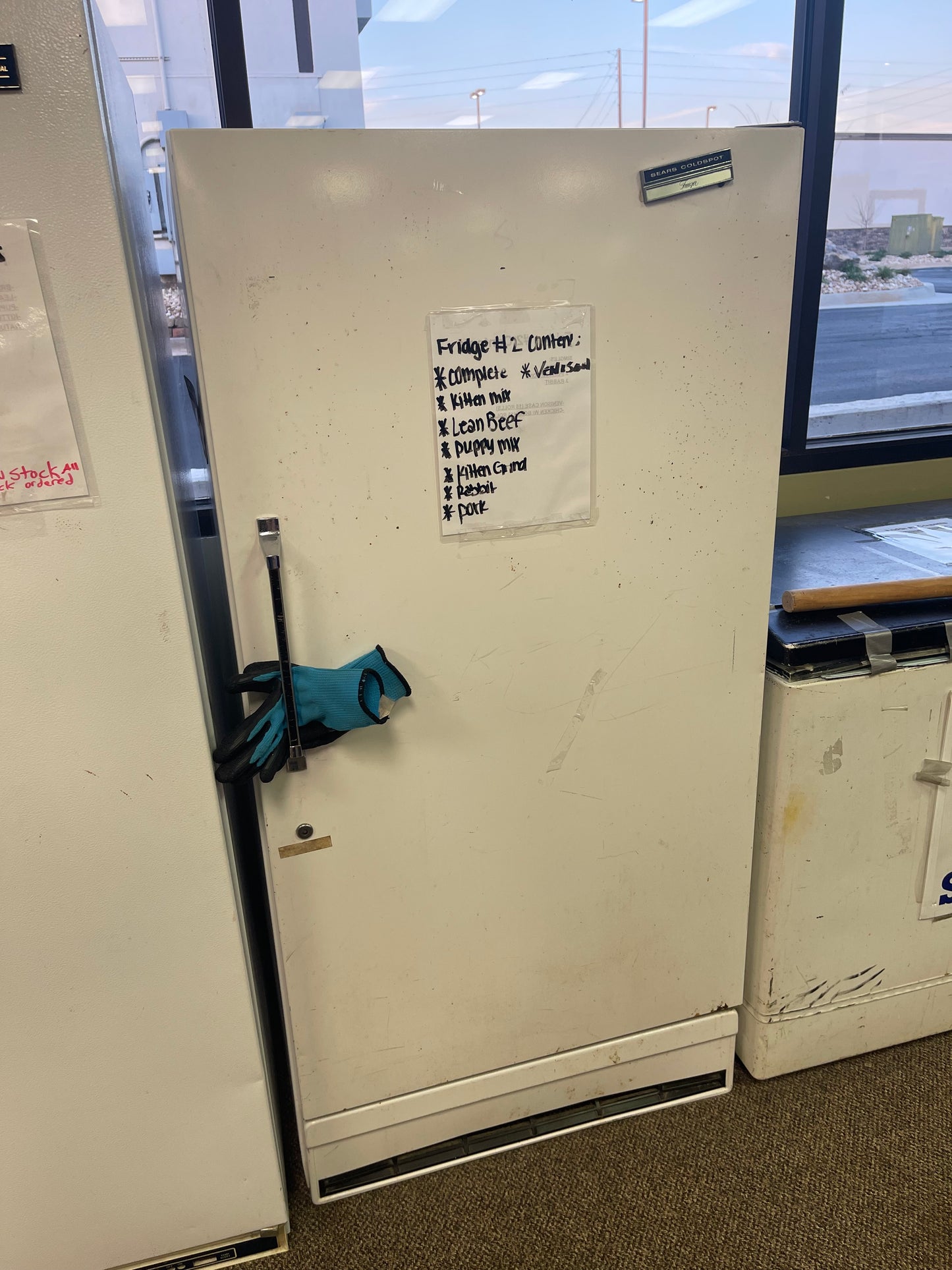 Residential upright freezer, previously used to store frozen raw dog food (must stay at the store till end of Dec)