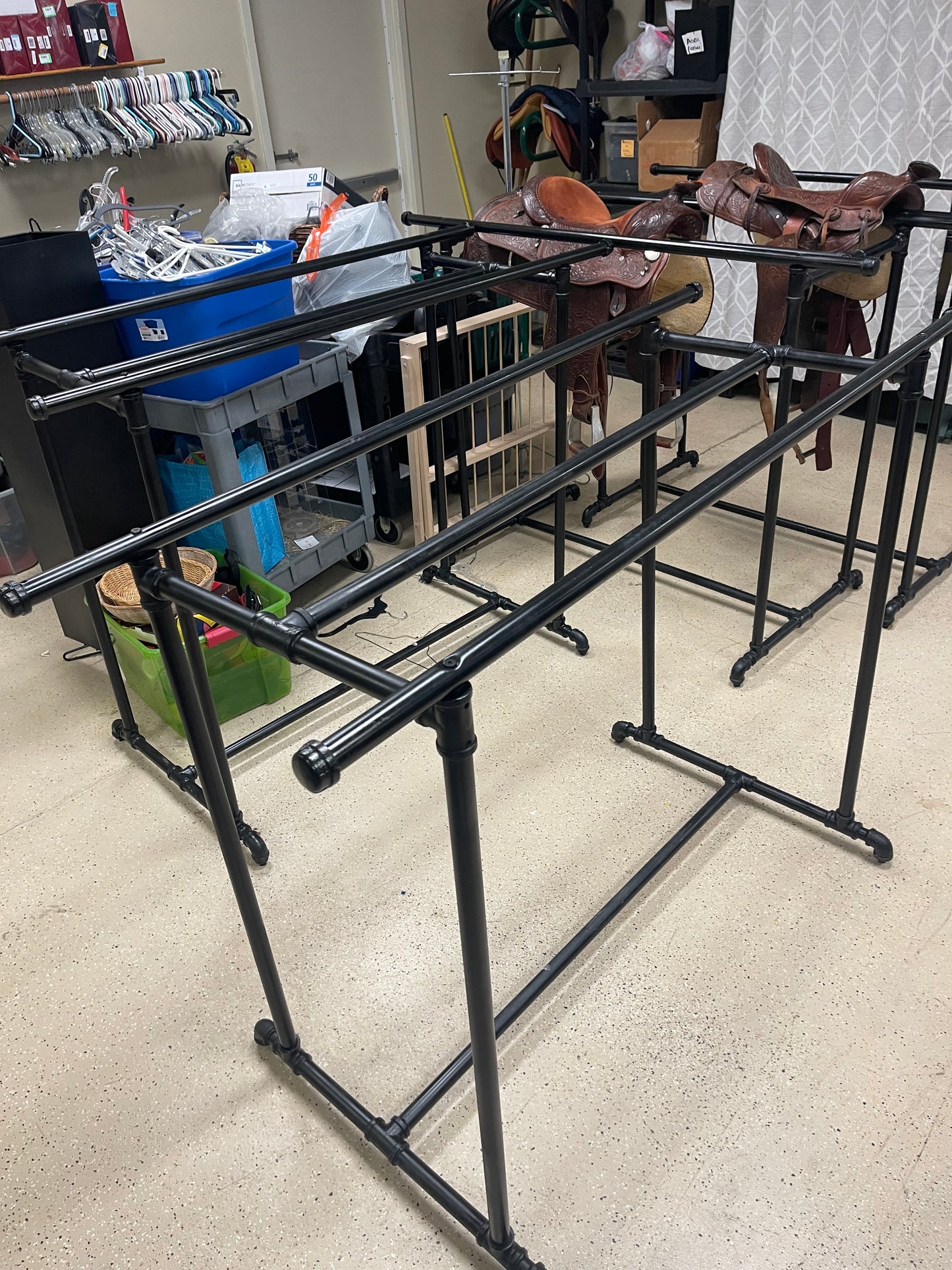 Black metal adjustable height heavy duty pipe racks, 2 sided