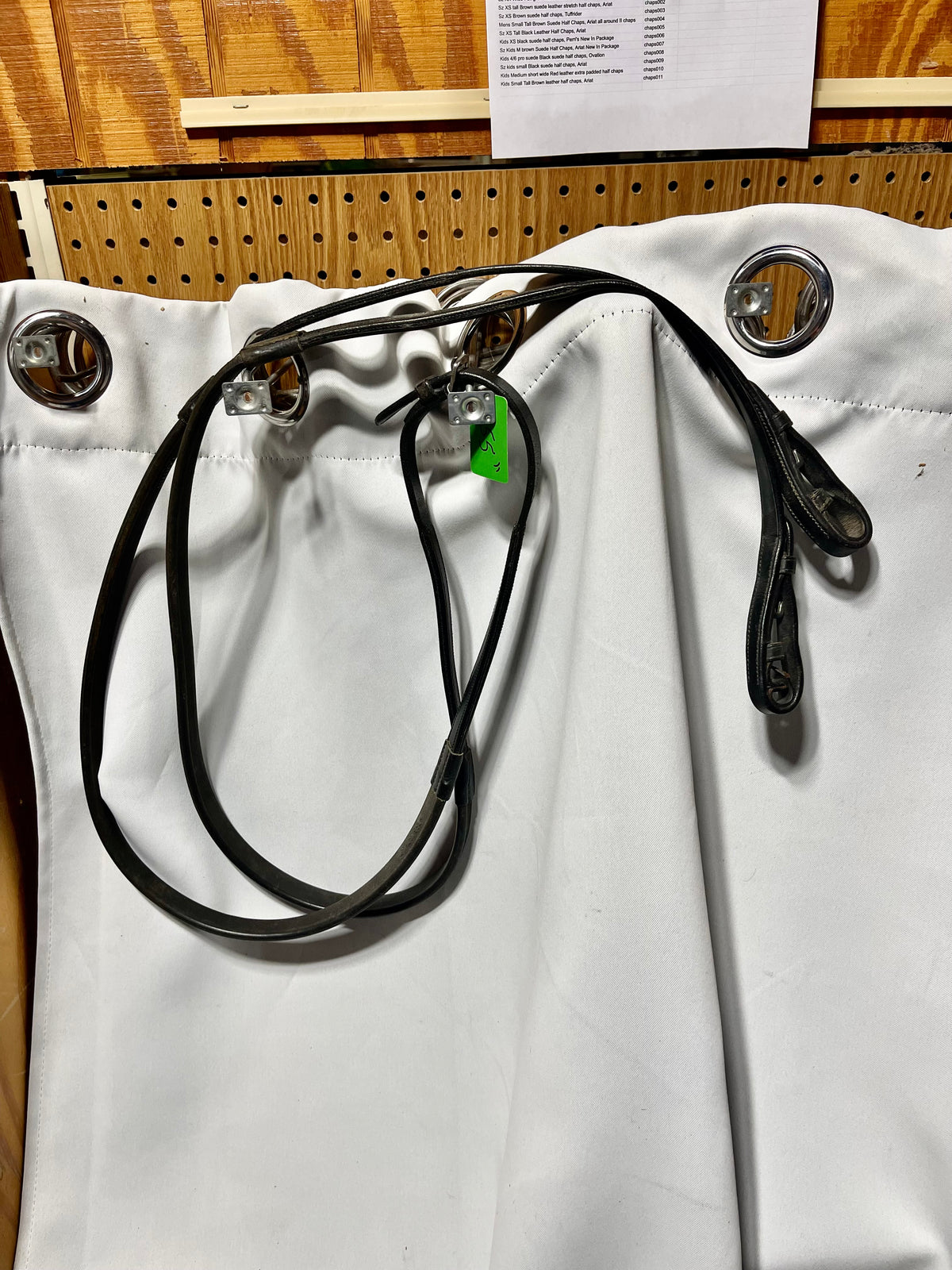 55" Equus Rubber Eventa black rubber grip reins, with bridle fastener ends. Well used