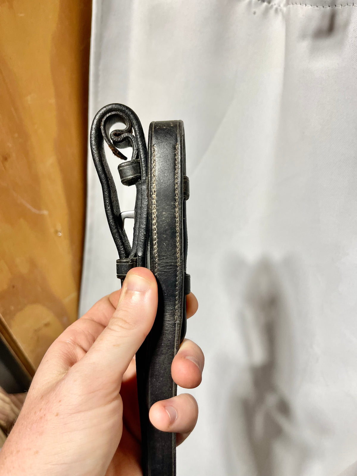 55" Equus Rubber Eventa black rubber grip reins, with bridle fastener ends. Well used