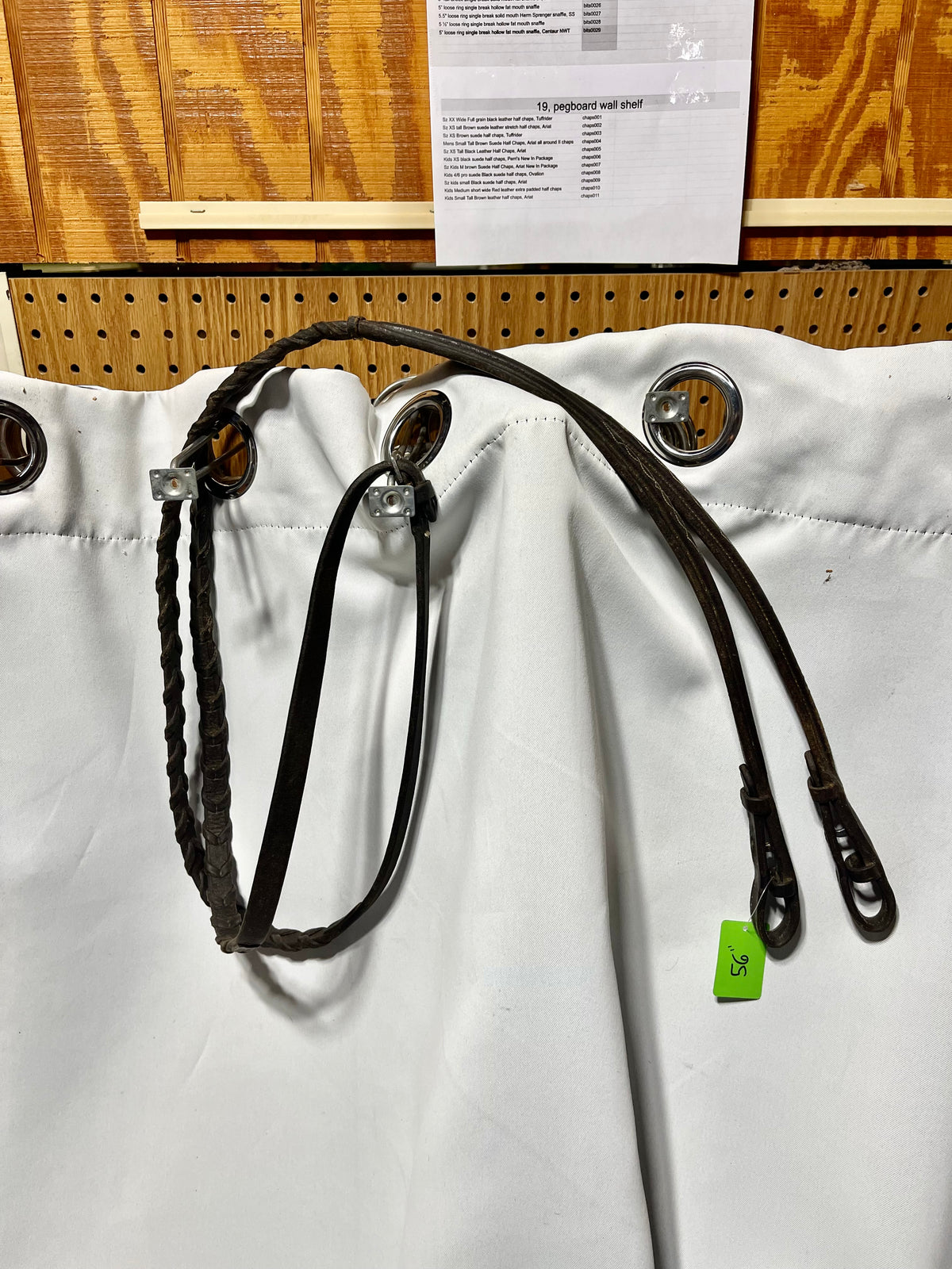 56” Brown raised fancy stitched laced English reins with double stitched bridle hook fastener ends, lightly used