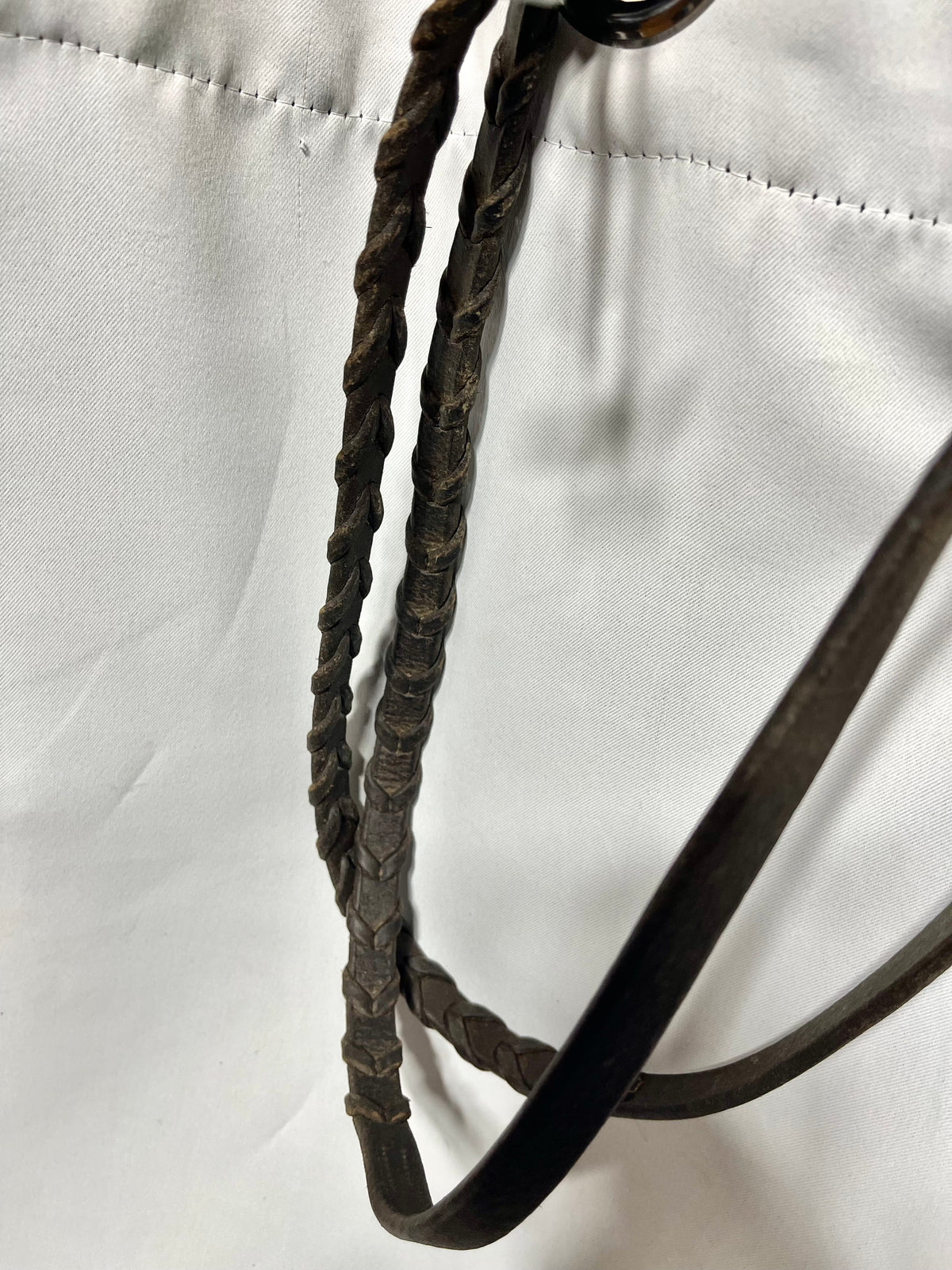 56” Brown raised fancy stitched laced English reins with double stitched bridle hook fastener ends, lightly used