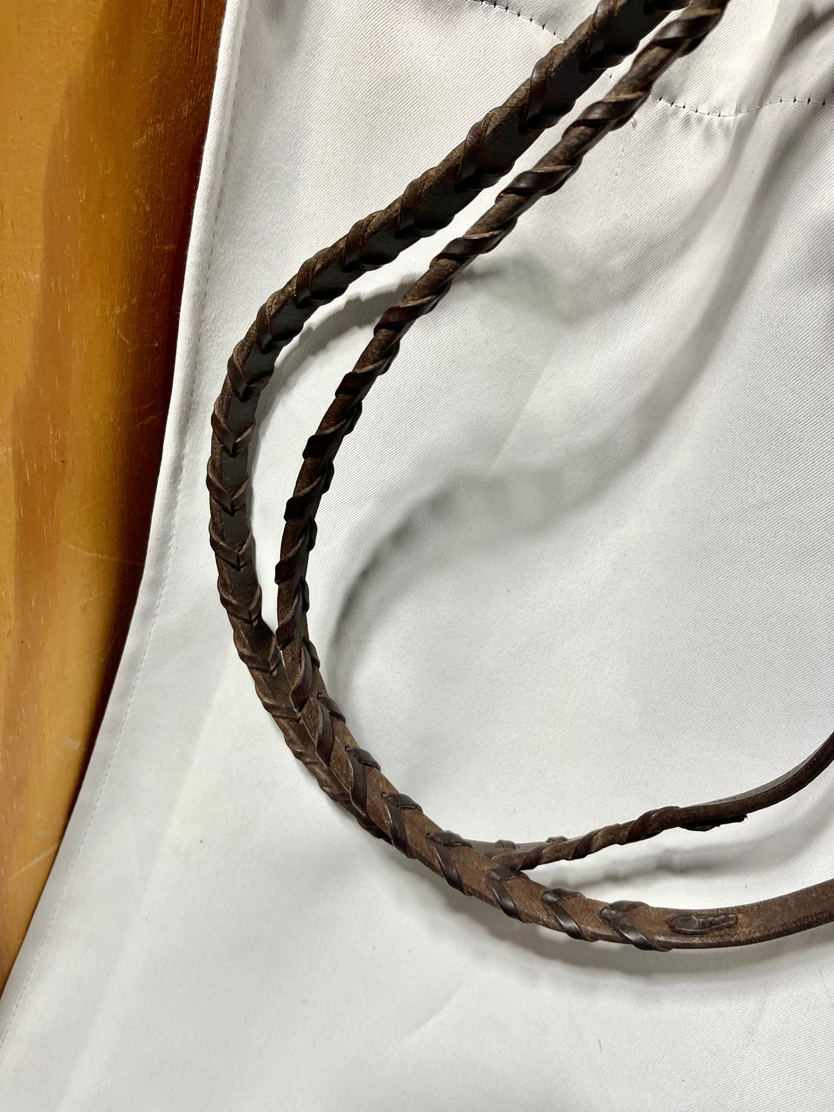 54" Brown raised fancy stitched laced English reins, bridle hook fastener ends-used