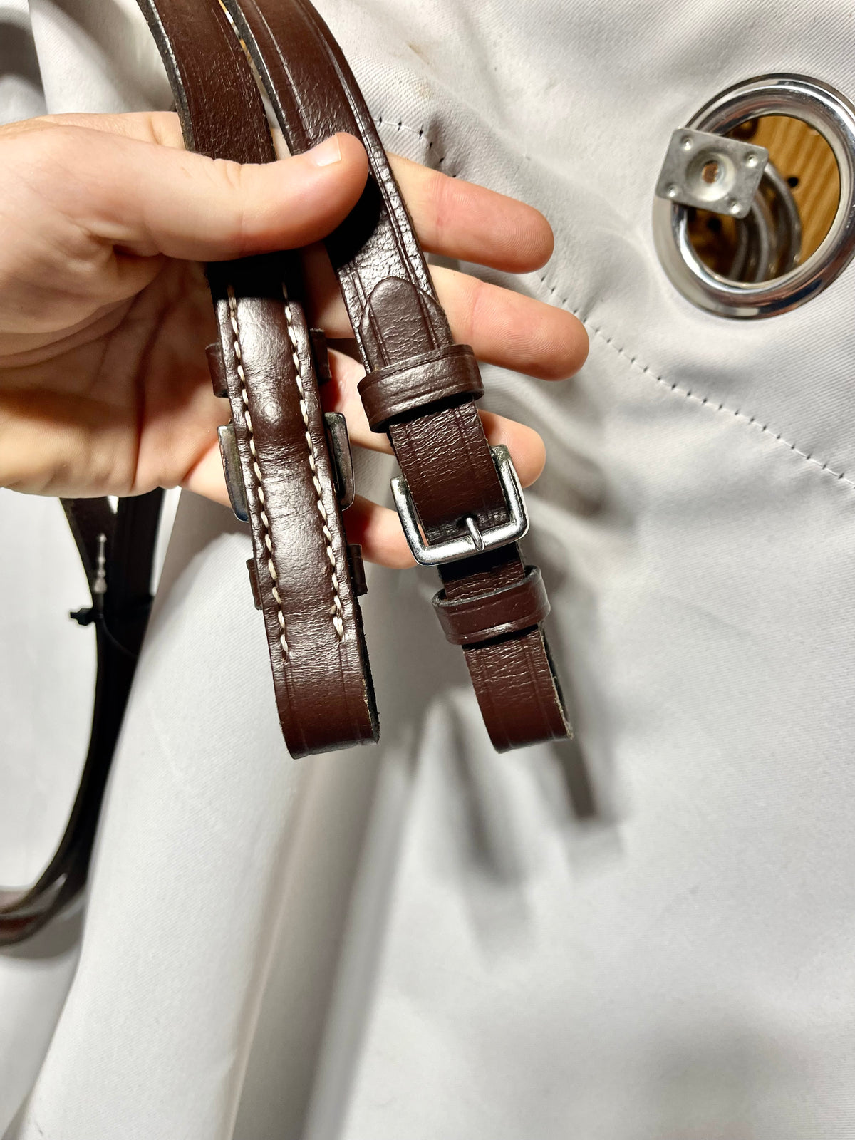 52" x 3/4” Red/Brown smooth leather English single reins, stitched center with no buckle, and with buckle ends