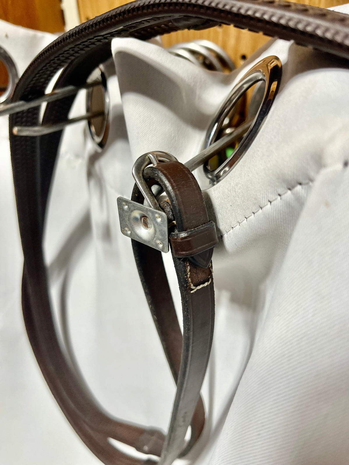 56" Kris brand Brown rubber English reins with stoppers on end and bridle hook end fasteners, like new