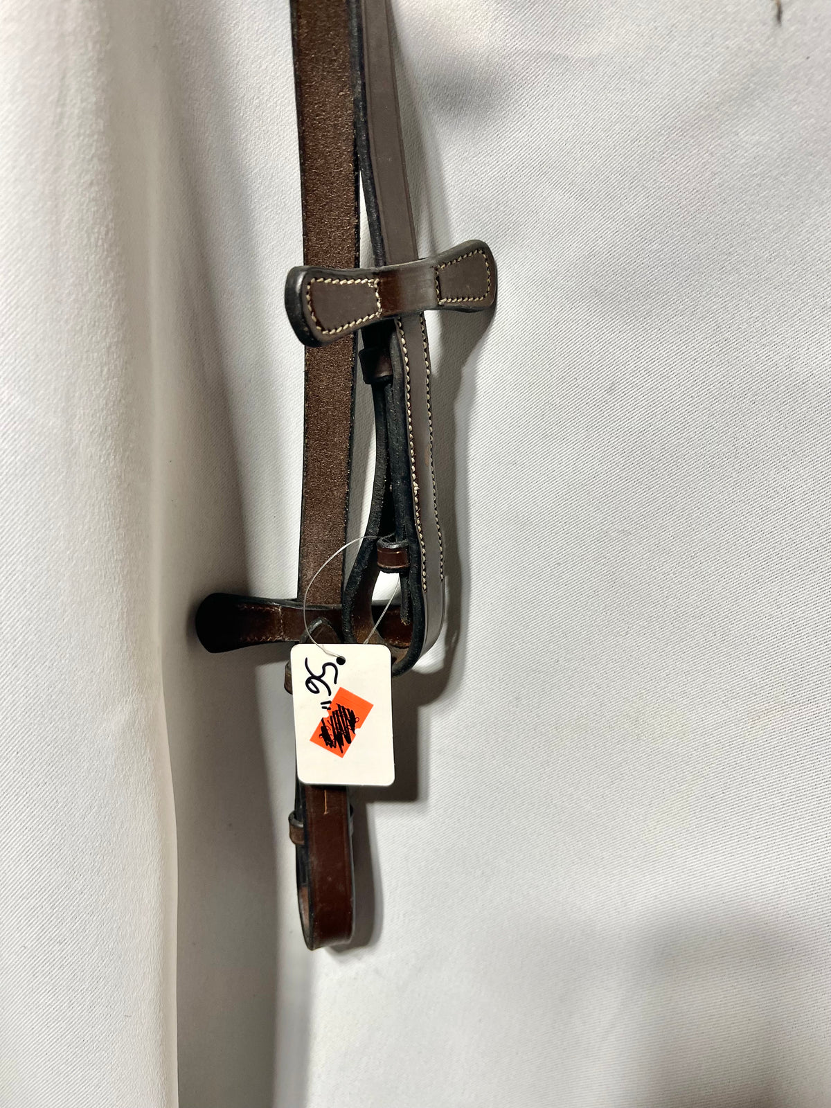 56" Kris brand Brown rubber English reins with stoppers on end and bridle hook end fasteners, like new