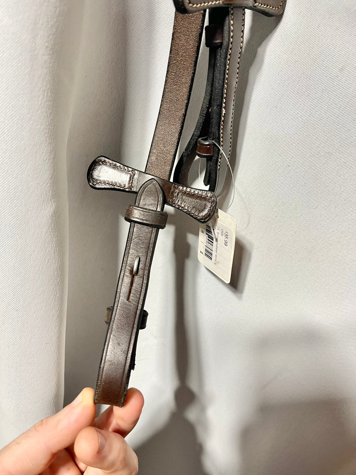 56" Kris brand Brown rubber English reins with stoppers on end and bridle hook end fasteners, like new